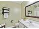 Neutral bathroom featuring a framed mirror and modern sink at 4434 Austin Hills Dr, Suwanee, GA 30024
