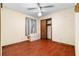 Bedroom with hardwood floors, ceiling fan and a closet at 5760 Windermere Ct, Lithonia, GA 30038