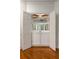Charming bar area with custom cabinetry, mirrored backsplash, and built-in glass racks at 912 Chipley Ct, Marietta, GA 30062