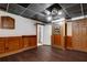 Basement with hardwood floors, panelled walls and unique reverse lettering on door at 912 Chipley Ct, Marietta, GA 30062