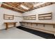 Unfinished basement with work area, wood shelving, and room for customized renovations and expansions at 912 Chipley Ct, Marietta, GA 30062