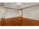 Large bedroom featuring hardwood floors and doorways into other rooms at 912 Chipley Ct, Marietta, GA 30062