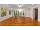 Bright bonus room with hardwood floors, large windows, and staircase access at 912 Chipley Ct, Marietta, GA 30062