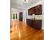 Elegant butler pantry with custom cabinetry, granite countertop, and convenient sink at 912 Chipley Ct, Marietta, GA 30062
