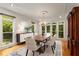 Dining area featuring large windows, elegant lighting, and stylish decor at 912 Chipley Ct, Marietta, GA 30062