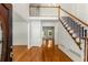 Bright foyer with hardwood floors, staircase, and second-story overlook at 912 Chipley Ct, Marietta, GA 30062