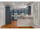 Kitchen featuring stone countertops, stainless appliances and light fixtures at 912 Chipley Ct, Marietta, GA 30062