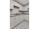 Traditional kitchen with white cabinetry, neutral countertop, and a sink area at 912 Chipley Ct, Marietta, GA 30062