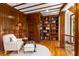 Cozy library features wood paneling, built-in bookshelves, and a comfortable reading area at 912 Chipley Ct, Marietta, GA 30062