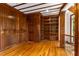 Elegant office features rich wood paneling, built-in bookshelves, and hardwood floors at 912 Chipley Ct, Marietta, GA 30062