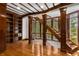 Beautiful wood staircase and book shelves featuring natural light and hardwood floors at 912 Chipley Ct, Marietta, GA 30062