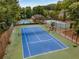 Community tennis court and swimming pool area, ideal for recreation and socializing within a picturesque setting at 912 Chipley Ct, Marietta, GA 30062