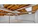 Unfinished basement with concrete floors, white walls, and open ceiling at 19 Quail Hollow Ct, Dallas, GA 30157