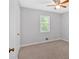 Bedroom with neutral carpet, a ceiling fan, and natural light at 19 Quail Hollow Ct, Dallas, GA 30157