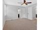 Spacious bedroom featuring carpet floors, a ceiling fan, and natural light at 19 Quail Hollow Ct, Dallas, GA 30157