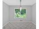 Bright dining room with large windows and tile flooring at 19 Quail Hollow Ct, Dallas, GA 30157