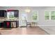 Spacious kitchen with a view to the outside and black appliances at 2013 Chesley Dr, Austell, GA 30106