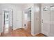 Bright hallway with hardwood floors and access to the living area at 2611 Leeshire Ct, Tucker, GA 30084