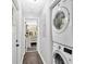 Hallway laundry area equipped with stackable washer and dryer at 428 Hulseytown Rd, Dallas, GA 30157