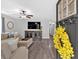 Inviting living room featuring stylish furniture, wood flooring, and a cozy, modern aesthetic at 428 Hulseytown Rd, Dallas, GA 30157