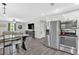 Open concept kitchen and living room offer a seamless flow perfect for entertaining, cooking, and relaxation at 428 Hulseytown Rd, Dallas, GA 30157