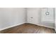 Neutral bedroom featuring a window with white trim and modern closet doors at 4286 Pool Rd, Winston, GA 30187