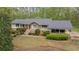 Charming single-story home with stone accents and a well-maintained front yard at 4286 Pool Rd, Winston, GA 30187