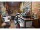 A cluttered garage featuring storage for tools and home repair equipment at 4286 Pool Rd, Winston, GA 30187