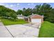 Charming single-story home with a brick facade, a two-car garage, and a well-maintained lawn at 10247 Deep Creek Pl, Union City, GA 30291