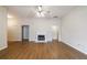 The spacious living room shows a fireplace and plenty of space for entertaining and Gathering at 10247 Deep Creek Pl, Union City, GA 30291