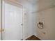 Mud room with wooden floors, white walls, and a wire storage shelf at 10247 Deep Creek Pl, Union City, GA 30291