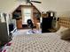 Bedroom with a large window, carpet floors, and a large desk with a rolling chair at 1902 Commons View Cir, Snellville, GA 30078