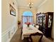 Traditional dining room featuring carpet, light fixture, and china cabinet for elegant dining experiences at 1902 Commons View Cir, Snellville, GA 30078