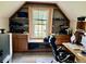 Well-lit office area with a large window, carpet floors, and a large desk with rolling chair at 1902 Commons View Cir, Snellville, GA 30078