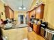 Kitchen with stainless steel appliances, granite counters, and breakfast bar at 1902 Commons View Cir, Snellville, GA 30078