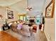 Inviting living room with vaulted ceiling, hardwood floors, large sofas, and a brick fireplace at 1902 Commons View Cir, Snellville, GA 30078
