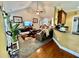Inviting living room featuring vaulted ceilings, plush carpeting, ceiling fan, and a cozy seating area at 1902 Commons View Cir, Snellville, GA 30078