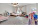 Spacious bedroom with two beds and natural light coming through two windows at 90 Citrine Way, Acworth, GA 30101