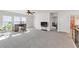 Large bonus room featuring a desk, ceiling fan, and plenty of open space at 90 Citrine Way, Acworth, GA 30101