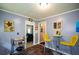 Cozy breakfast nook with seating, bright decor, and open access to living areas at 511 Reid St, Villa Rica, GA 30180