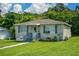 Charming single-story home with a well-maintained lawn and blue shutters at 511 Reid St, Villa Rica, GA 30180