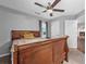 Bedroom with a wooden bed frame and views of an adjoining fireplace at 530 Georgian Hills Dr, Lawrenceville, GA 30045