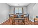 Cozy dining area with rustic wooden table and comfortable seating at 530 Georgian Hills Dr, Lawrenceville, GA 30045