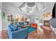 Cozy living room with a fireplace, high ceilings, and comfortable seating at 530 Georgian Hills Dr, Lawrenceville, GA 30045
