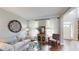 Bright living room with natural light, hardwood floors, and cozy furniture, creating a comfortable atmosphere at 1346 Wind Chime Ct, Lawrenceville, GA 30045