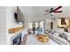 Bright and modern living room with stylish fireplace, and open to kitchen and entryway at 1346 Wind Chime Ct, Lawrenceville, GA 30045