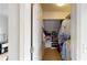 Well-organized walk-in closet with ample shelving and shoe storage at 1346 Wind Chime Ct, Lawrenceville, GA 30045
