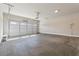 Spacious garage with a white garage door and concrete flooring ready for your vehicles and projects at 2080 Cactus Ln, Cumming, GA 30040