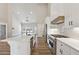 Spacious kitchen with large island, stainless steel appliances, and open concept living area at 2080 Cactus Ln, Cumming, GA 30040