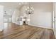 Spacious open-concept home features hardwood floors and seamlessly integrates kitchen and living space at 2080 Cactus Ln, Cumming, GA 30040